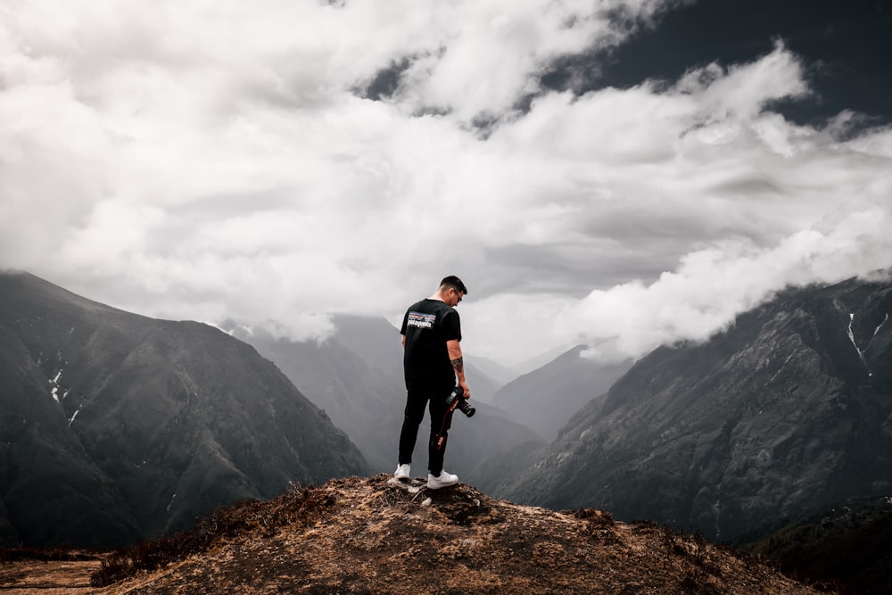 man standing near cliff