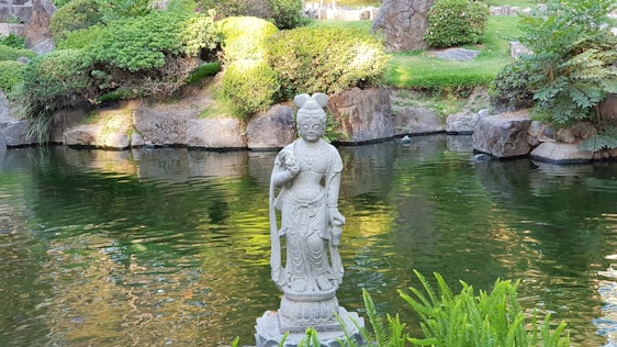 A beautifully crafted sculpture displayed in a serene setting.