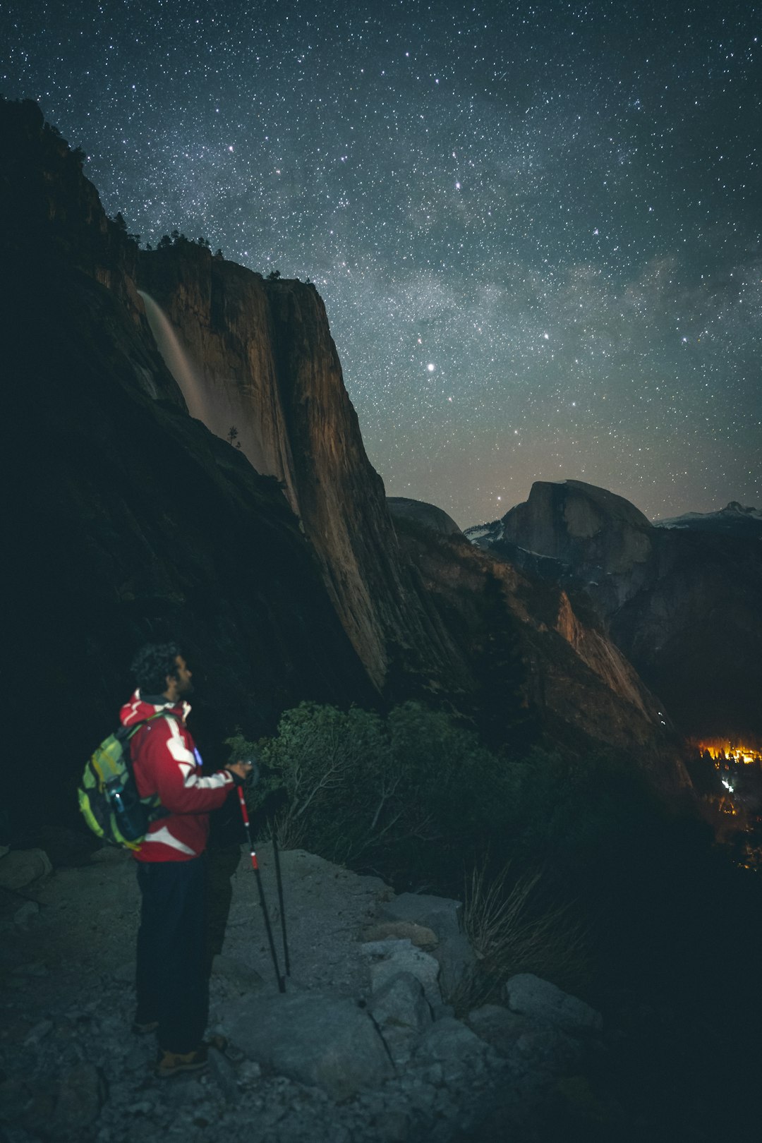 man standing on rock formation