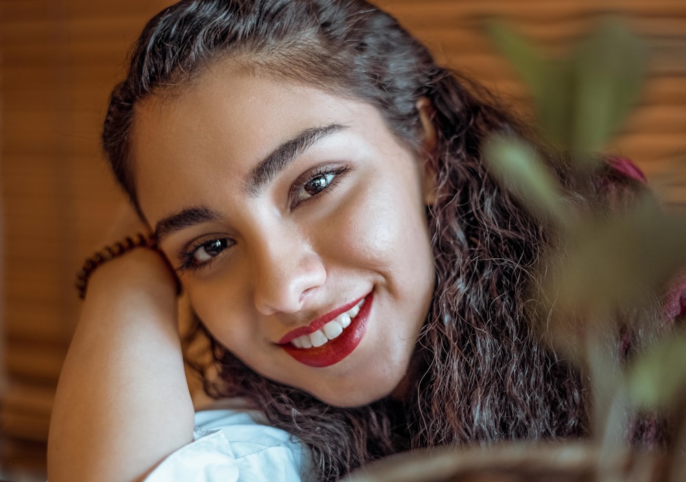 selective focus photography of woman smiling
