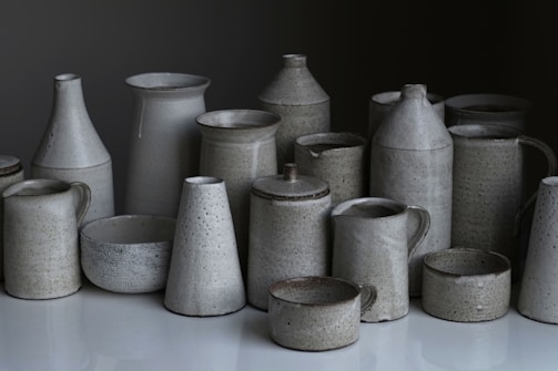 A collection of practical ceramic items arranged aesthetically.