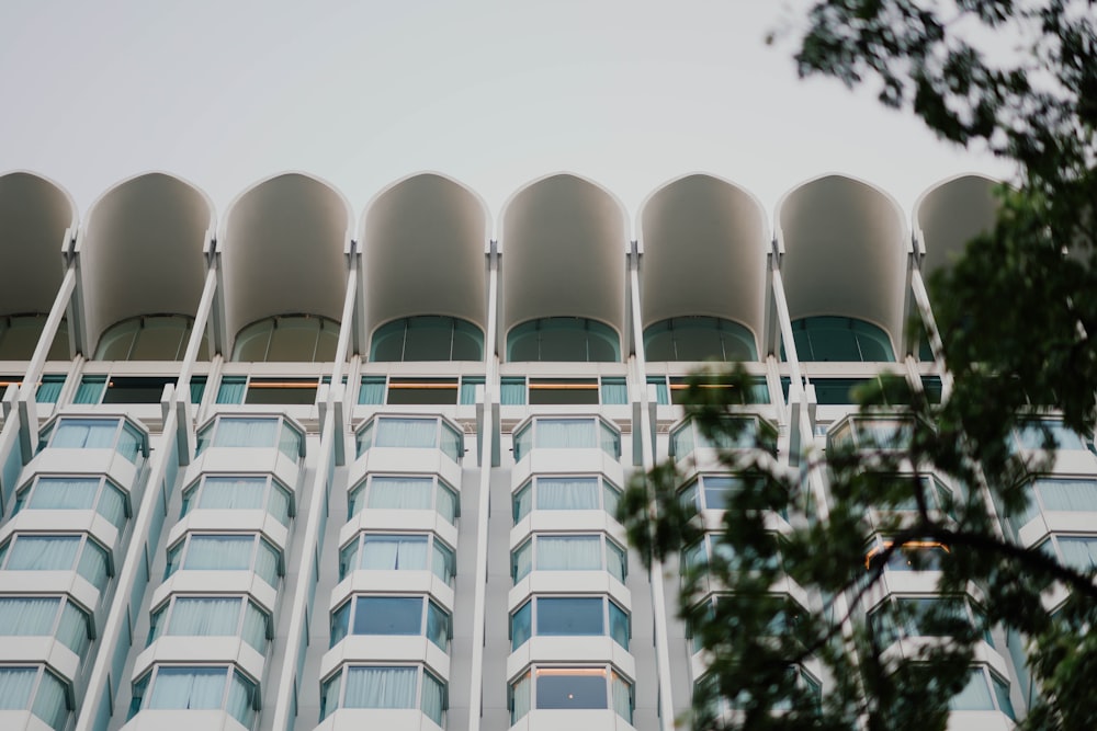 white high-rise building low-angle photo