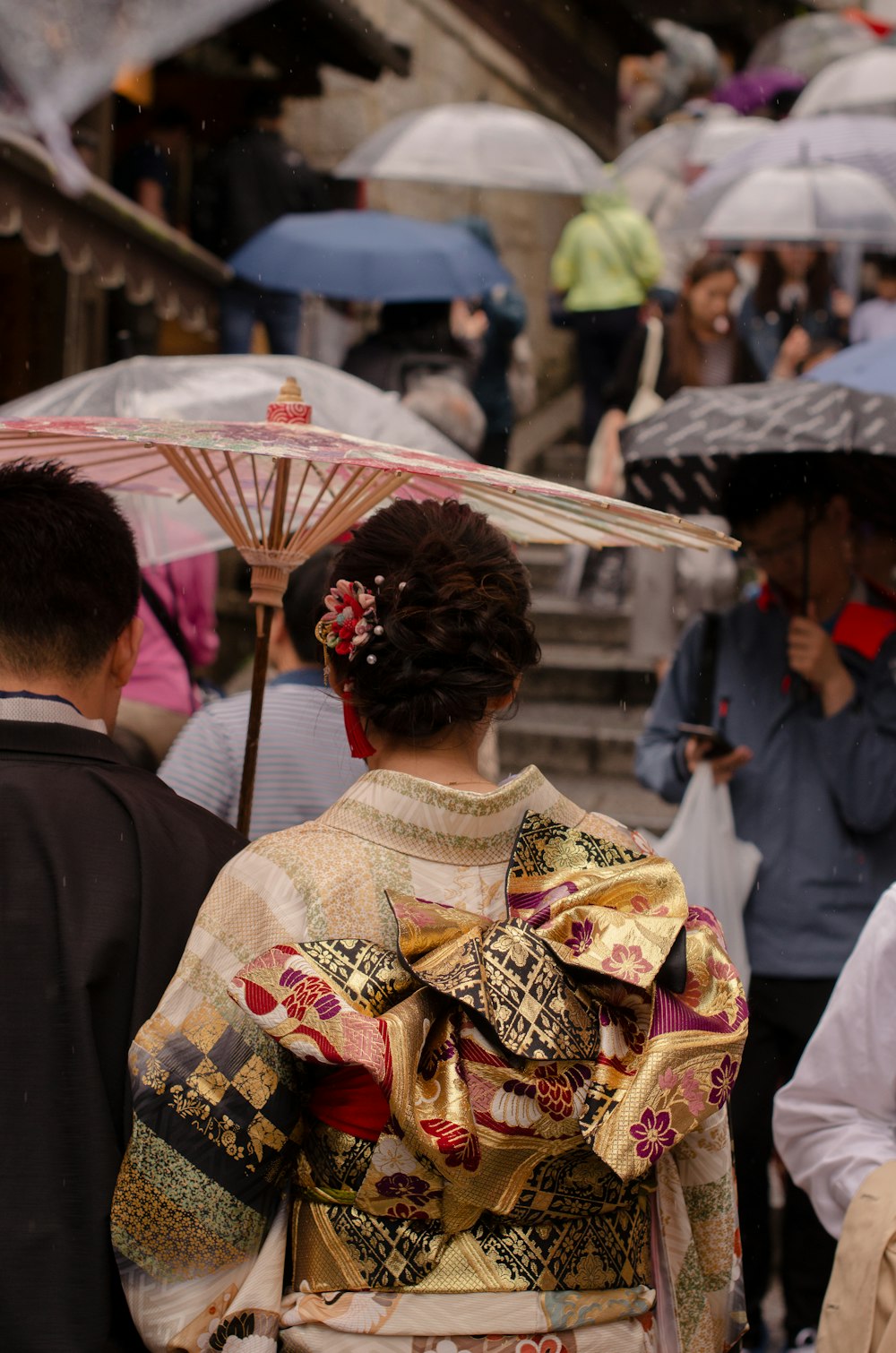 people using umbrellas