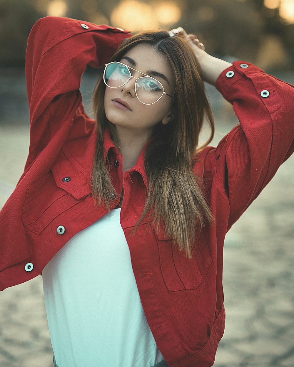 woman in red button-up denim jacket