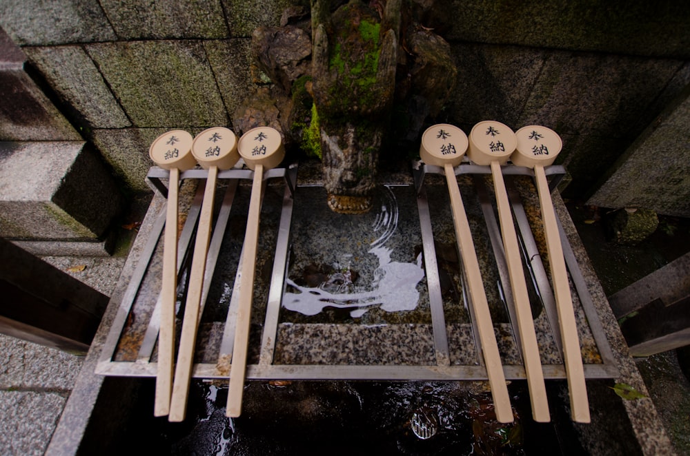 six brown wooden sticks