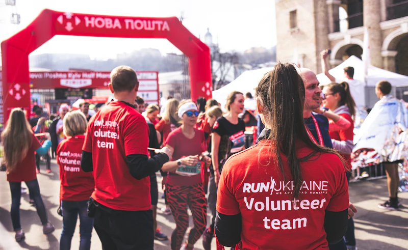 Young people and adults taking part in a community fun run