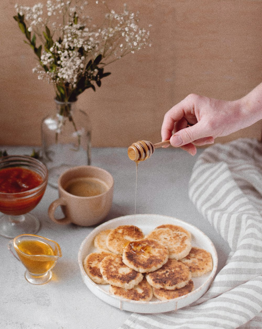 pancake with honey on round white platter