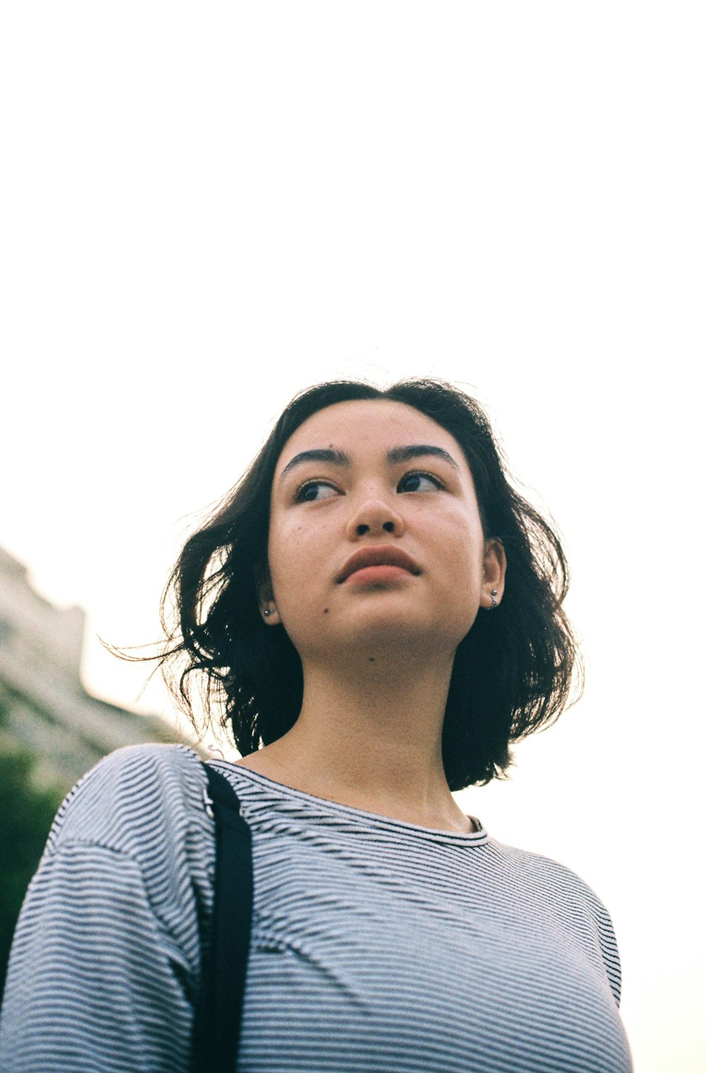 woman wearing blue and white striped shirt