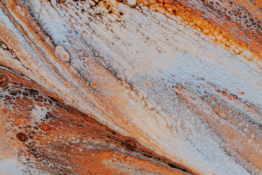 a close up of a brown and white substance