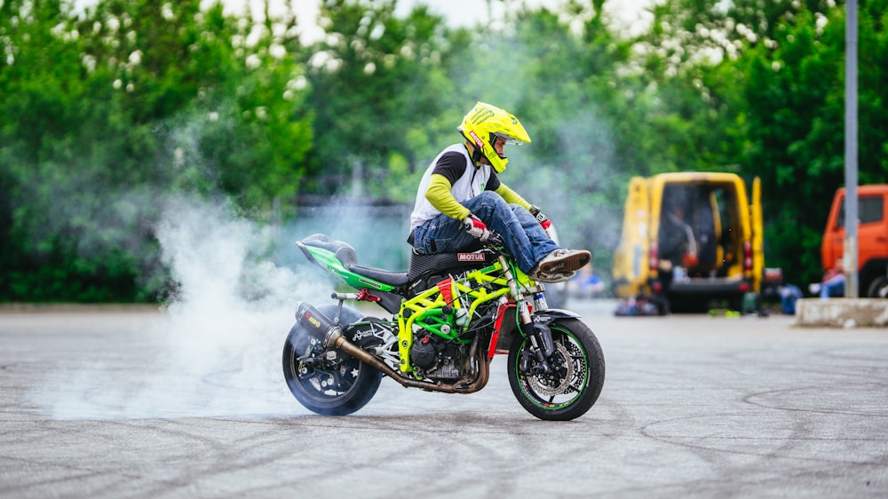 man doing motorcycle trick