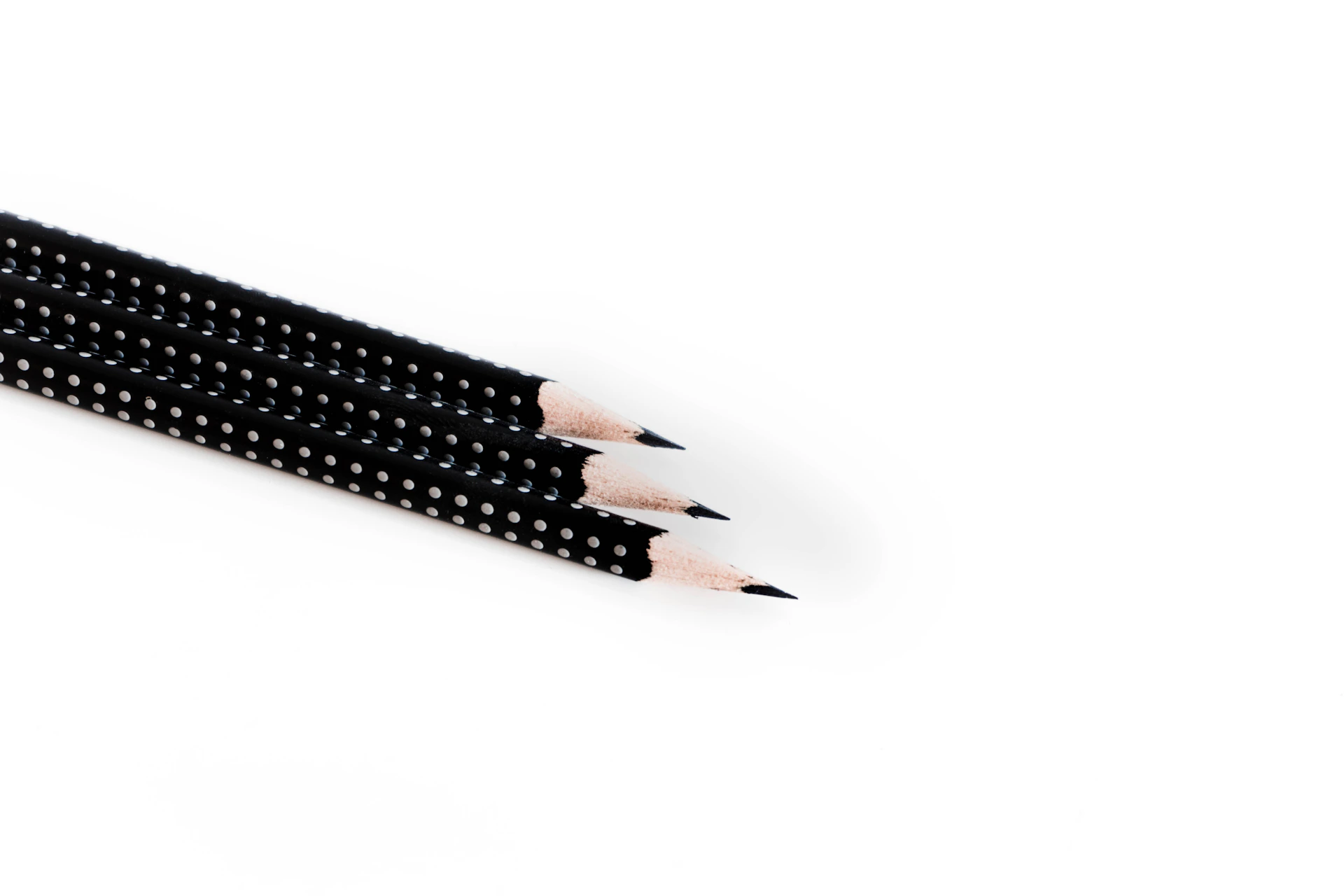 three black pencils