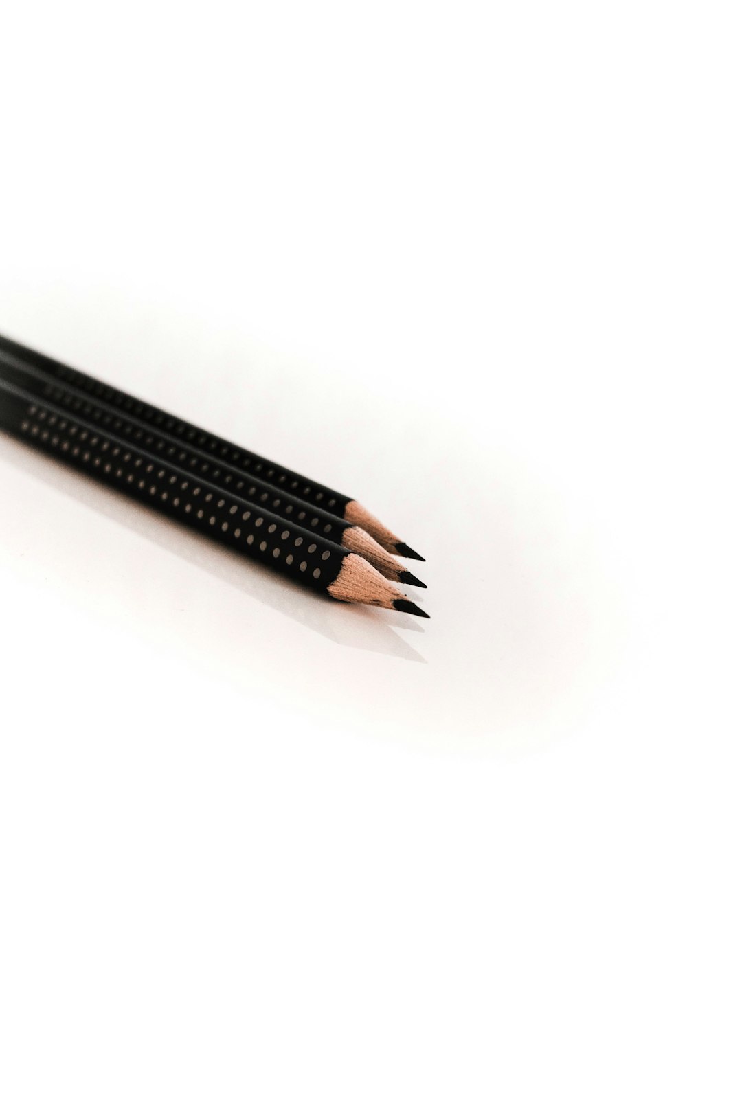 three black pencils