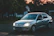 gray Opel sedan park outside during golden hour