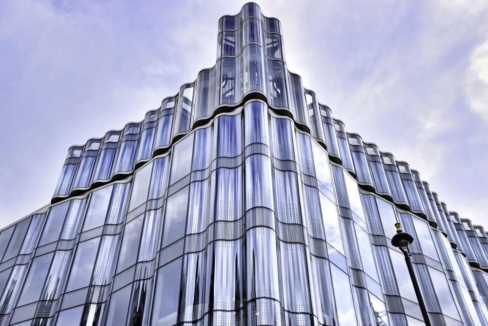 low angle photo of glass curtain building