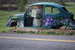 blue Volkswagen beetle