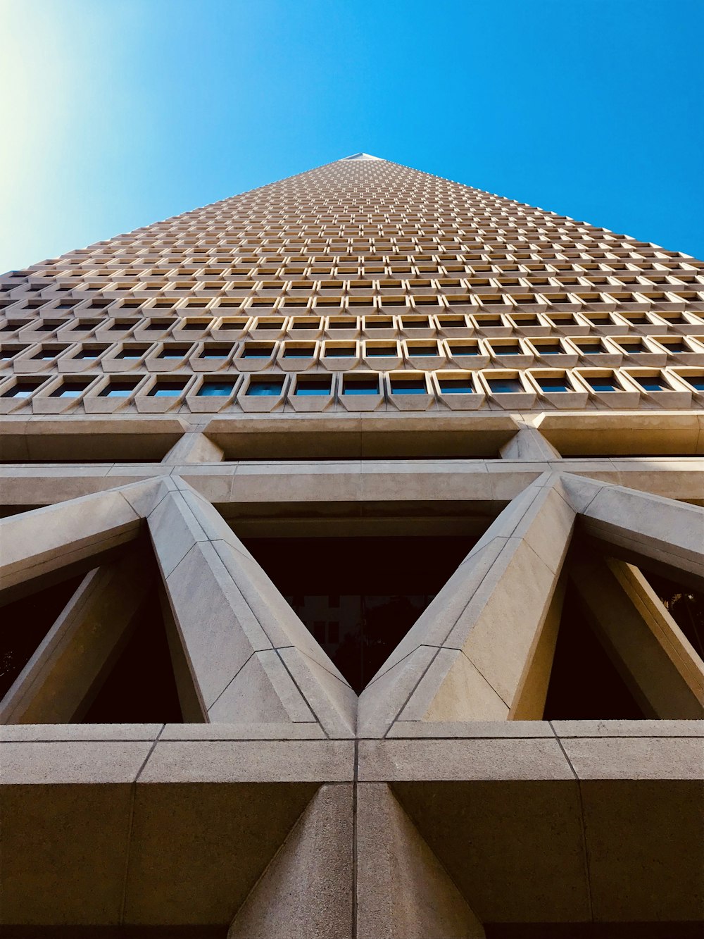 worms-eye-view photography of brown building