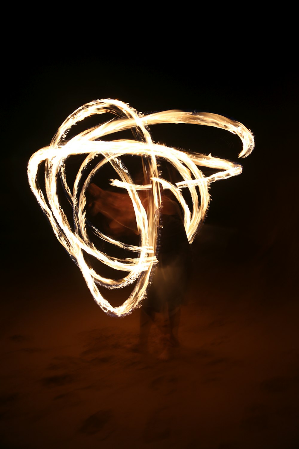 fire dancing at night time