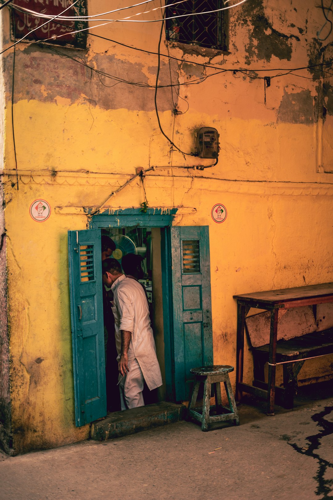 man standing in an open door