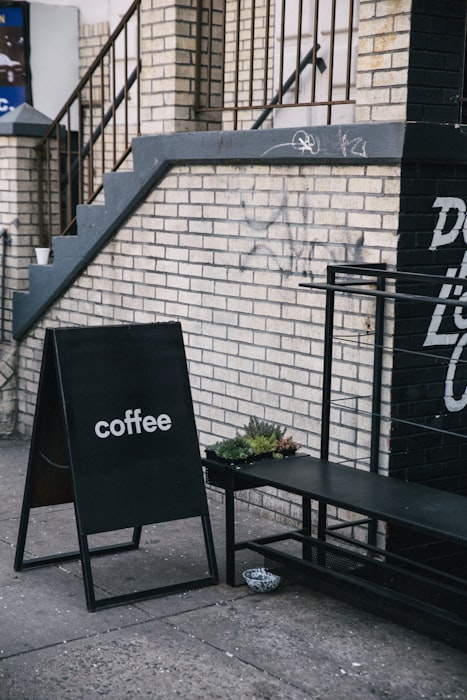 Cafe with sidewalk A-frame sign - example of affordable F&B business signage
