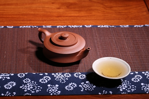 brown ceramic teapot