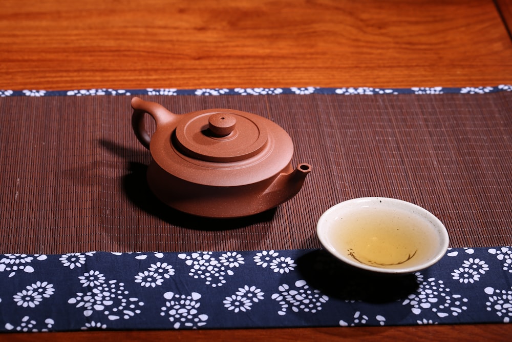 brown ceramic teapot