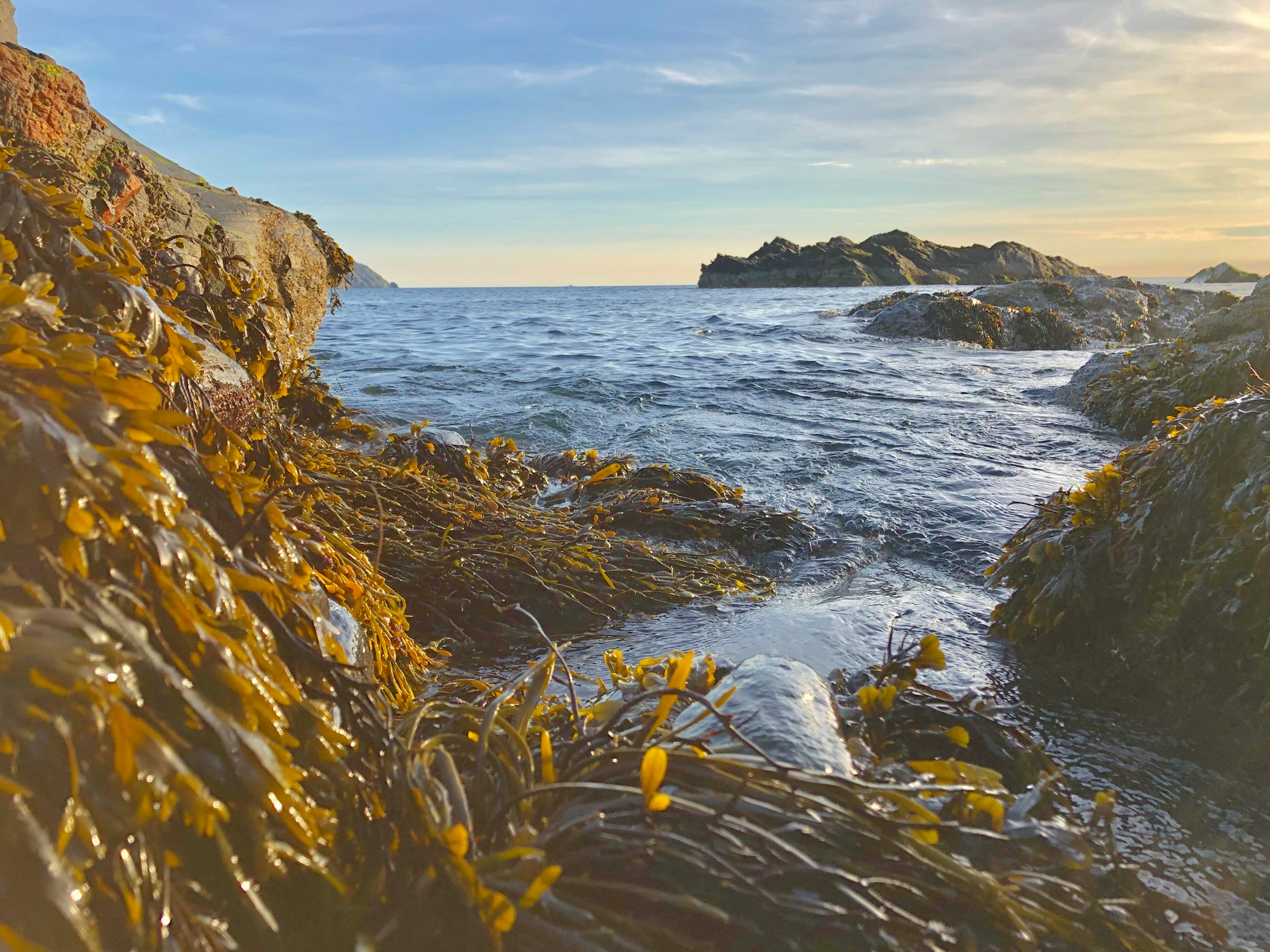 Ocean water entering a tide pool.