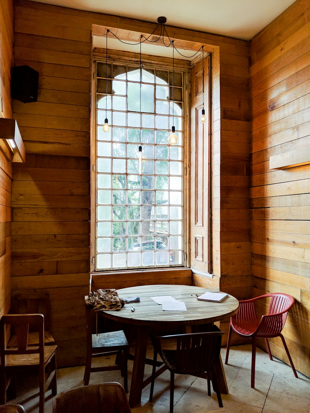 empty dining room with opened French window