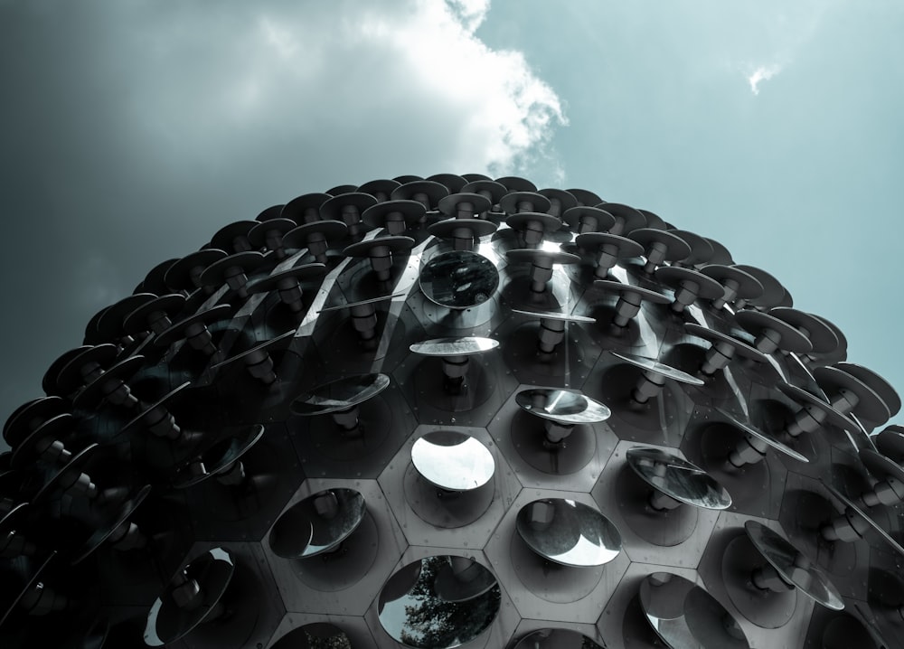 low-angle photography of gray dome building under cloudy sky