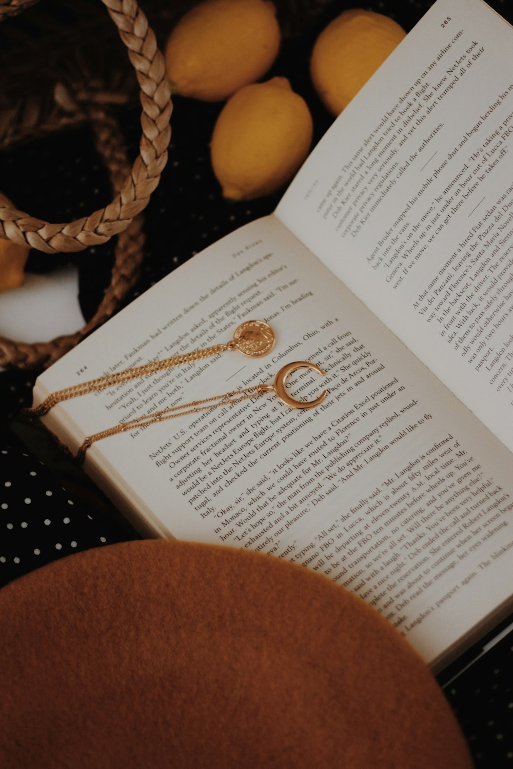 gold-colored crescent moon necklace