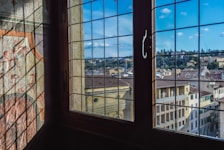 View of the triple room’s window overlooking the city streets.