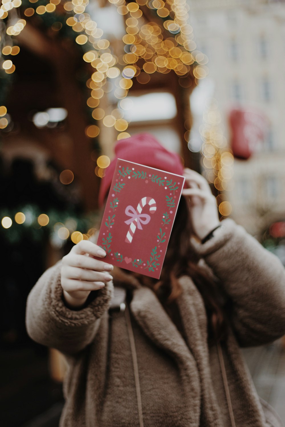 person holding red boxz