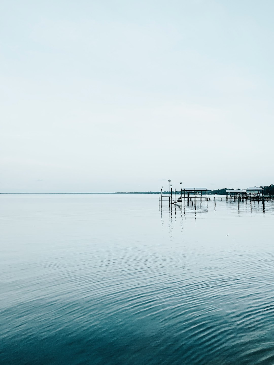 dock and ocean during day