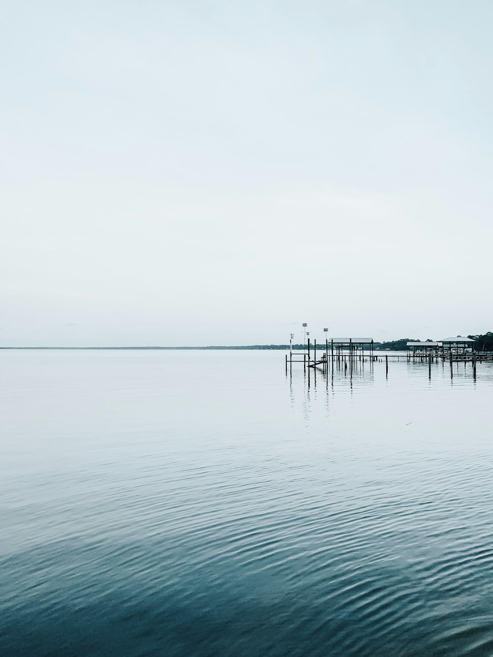 dock and ocean during day