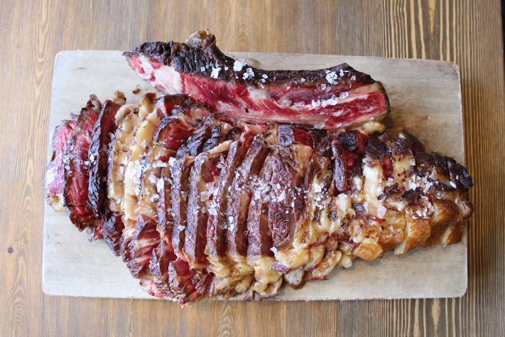 cooked meat on brown tray