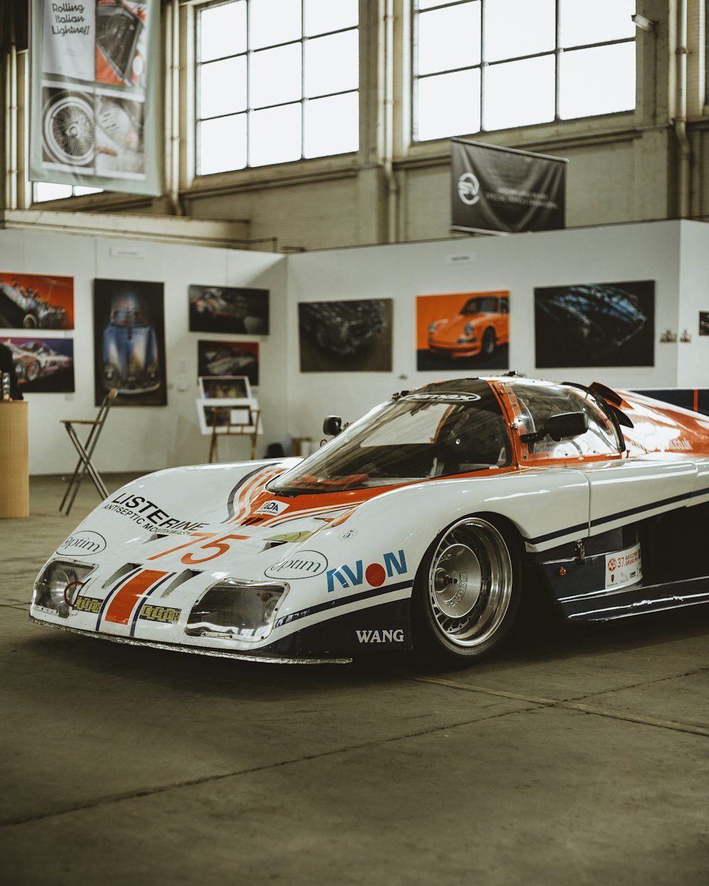 white and black sports vehicle inside well lit room