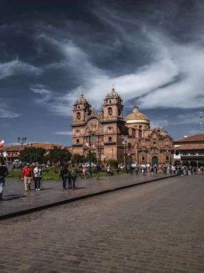 people walking near cathedral at daytime