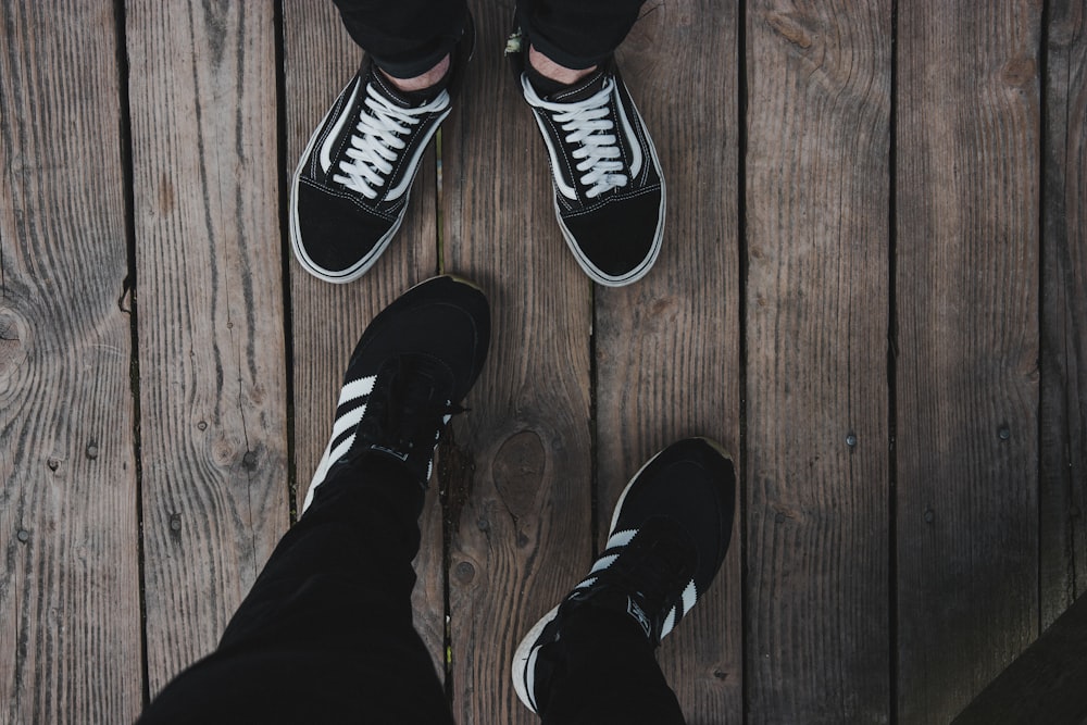Person wearing black-and-white Vans Old Skool shoes photo – Free Shoe Image  on Unsplash