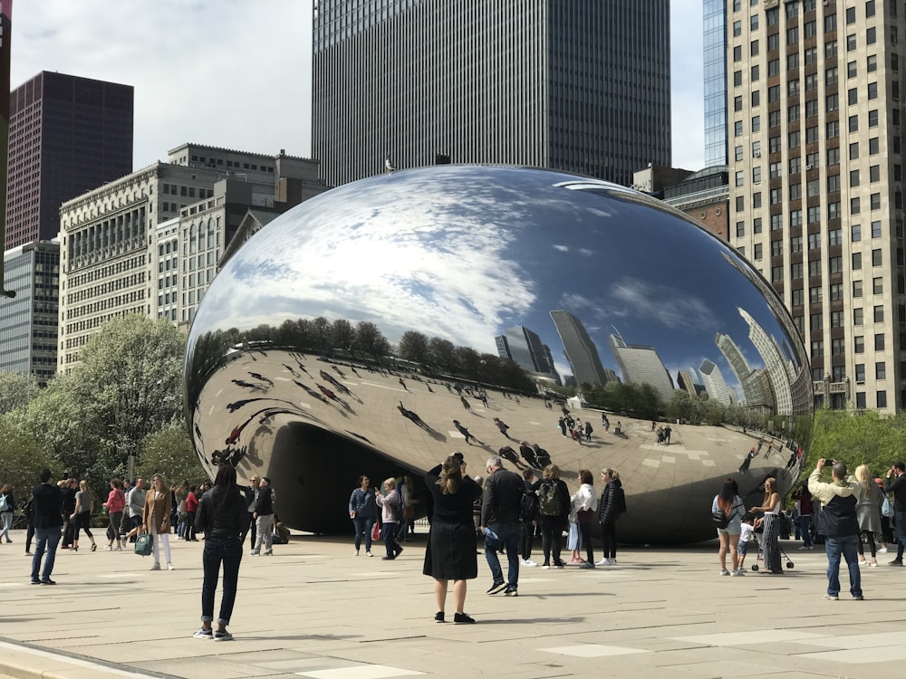 people standing near dome building