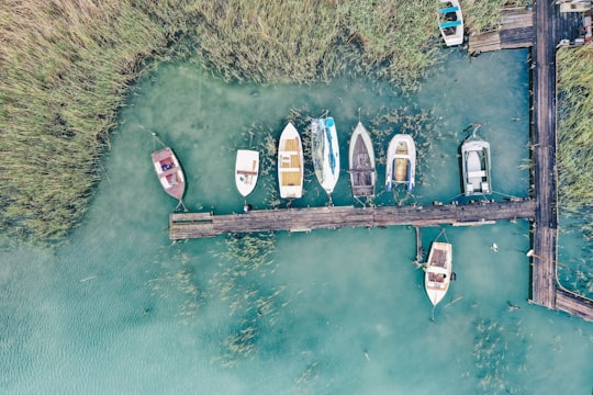top view of a wooden dock with boats in Csopak Hungary