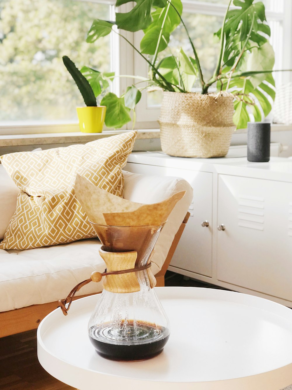 coffee pot on table near sofa