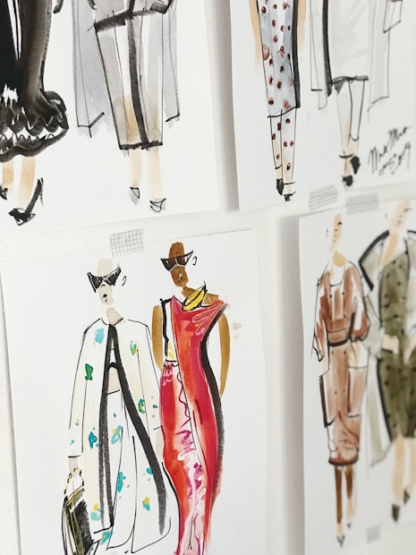 A set of fashion illustrations featuring stylish outfits and models. The drawings are done in watercolor, displaying a variety of clothing designs including dresses and coats, with attention to details such as patterns and accessories.