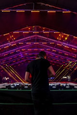 DJ facing DJ mixer