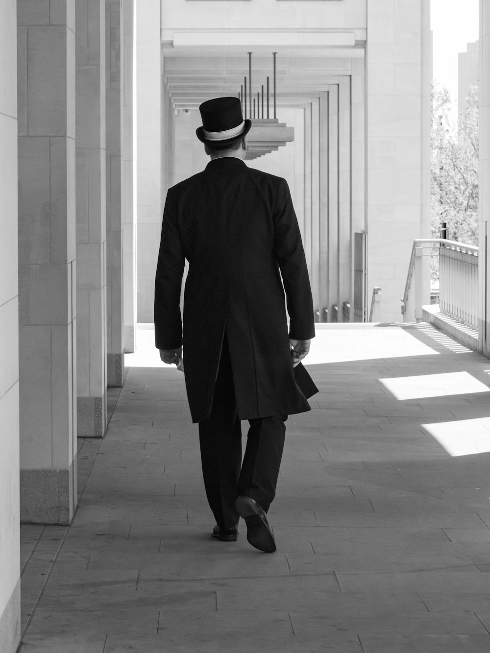 man wearing jacket walking