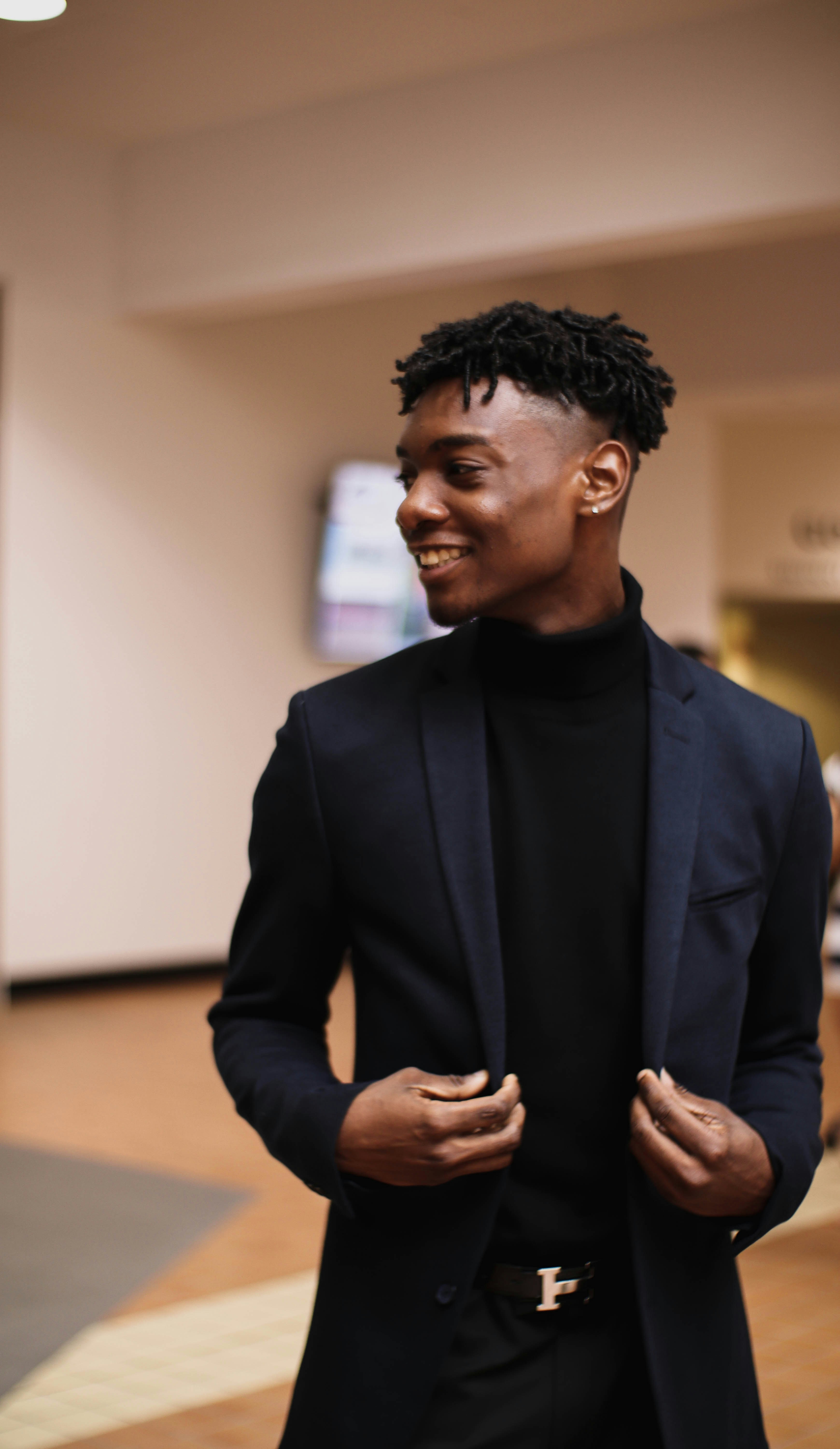 black coat and black shirt