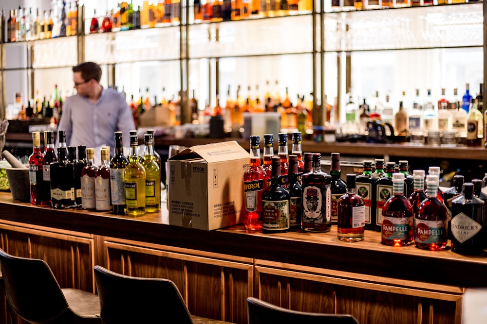 black wooden bar with liquor bottles