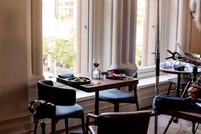 A dining area with a table set for two, showcasing a delicious meal.