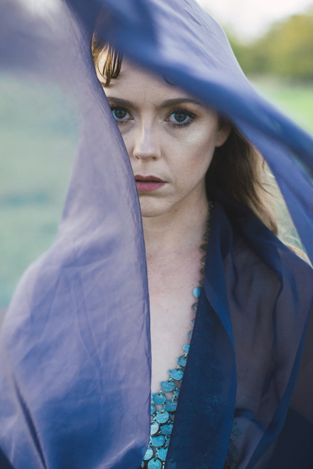 woman wearing blue scarf