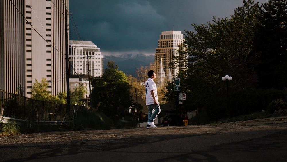 man standing on concrete gound