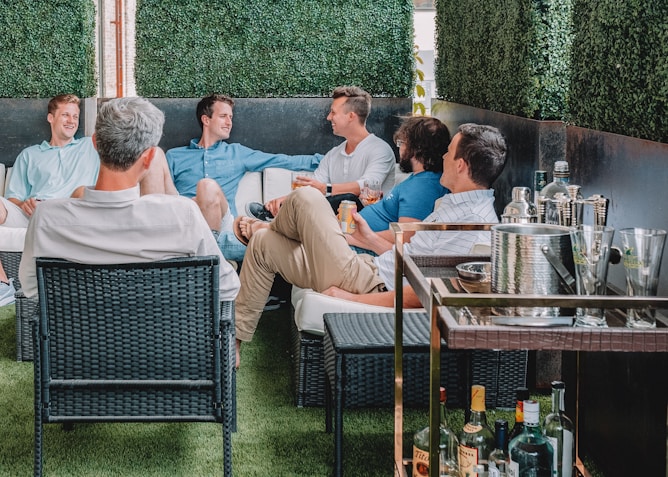 men sitting on chairs