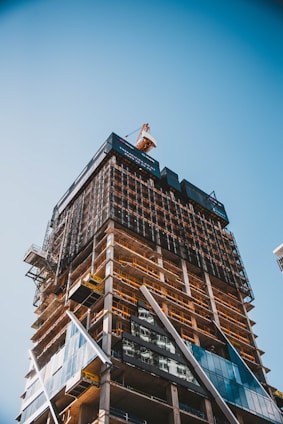 brown and gray building under construction